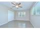 Clean bedroom with neutral colors and a ceiling fan at 2201 Horan S Way, Gulfport, FL 33707