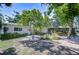 Beautifully landscaped front yard with modern white rock accents and healthy, mature landscaping at 2201 Horan S Way, Gulfport, FL 33707