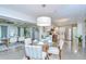 Bright, airy dining area and kitchen featuring stainless steel appliances and an open layout perfect for entertaining at 2201 Horan S Way, Gulfport, FL 33707
