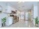 Spacious kitchen featuring stainless steel appliances, white cabinets, and ample counter space for meal preparation at 2201 Horan S Way, Gulfport, FL 33707