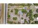 Expansive property featuring lush landscaping and a house, as seen from above at 2221 W Lake Dr, Wimauma, FL 33598