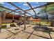 Large chicken coop with shade, multiple enclosures, and feeding stations at 2221 W Lake Dr, Wimauma, FL 33598