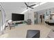Bright and open living room features modern decor, vaulted ceilings, and an open floor plan at 2240 Pinewood Villas Dr, Holiday, FL 34691