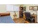 Bedroom featuring a desk, a bookcase, and a daybed near the window at 2460 Northside Dr # 708, Clearwater, FL 33761