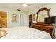 Bedroom with an oversized dresser, large mirror, and ensuite bath at 2460 Northside Dr # 708, Clearwater, FL 33761