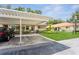 Well-maintained condo featuring covered parking and manicured landscaping, creating an inviting curb appeal at 2460 Northside Dr # 708, Clearwater, FL 33761
