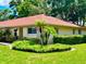 Inviting single-story home with mature landscaping and a red roof for a charming curb appeal at 2460 Northside Dr # 708, Clearwater, FL 33761