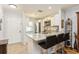 Modern kitchen featuring granite countertops, stainless steel appliances, and stylish bar seating at 2460 Northside Dr # 708, Clearwater, FL 33761
