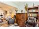Cozy living area with a desk, ample seating, and view into the main living room at 2460 Northside Dr # 708, Clearwater, FL 33761