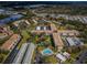 Overhead view of a community featuring buildings, pool, green space, and parking at 2700 Bayshore Blvd # 1206, Dunedin, FL 34698