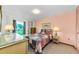 A charming bedroom with soft lighting, dresser, and closet space at 2700 Bayshore Blvd # 1206, Dunedin, FL 34698