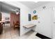 Hallway area with tiled floors, leading to other rooms and features a built in desk at 2700 Bayshore Blvd # 1206, Dunedin, FL 34698