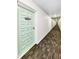 Hallway view with a unique patterned carpet, leading to residential units in a well-maintained building at 2700 Bayshore Blvd # 1206, Dunedin, FL 34698