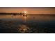 Beautiful waterfront with boats on the water at sunset at 2700 Bayshore Blvd # 1206, Dunedin, FL 34698