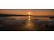 Picturesque waterfront view with calm waters, boats, and buildings at 2700 Bayshore Blvd # 1206, Dunedin, FL 34698