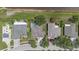 Aerial view of a home featuring a pool and a well-maintained yard at 27826 Sora Blvd, Wesley Chapel, FL 33544