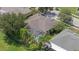 Birds-eye view showcases private pool, screened lanai and landscaping at 27826 Sora Blvd, Wesley Chapel, FL 33544