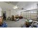 Spacious garage with ample storage space and a functional garage door at 27826 Sora Blvd, Wesley Chapel, FL 33544