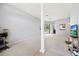Spacious living room boasts ample natural light and flows into other living areas, perfect for modern living at 27826 Sora Blvd, Wesley Chapel, FL 33544