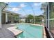 A screened-in pool provides a private outdoor oasis for relaxation and recreation at 27826 Sora Blvd, Wesley Chapel, FL 33544