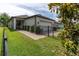 Charming single-Gathering home featuring a two-car garage, walkway, manicured lawn, and a fenced yard at 3037 Riders Pass, Odessa, FL 33556