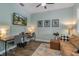 Comfortable office area with a modern design, a comfortable couch, and natural lighting at 3037 Riders Pass, Odessa, FL 33556