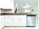 Kitchen features granite countertops, stainless steel appliances, and ample cabinet space at 30798 Veridian Way, Wesley Chapel, FL 33543