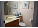 Bathroom featuring a vanity with cabinet storage and neutral color at 3200 Cove Cay Dr # 5F, Clearwater, FL 33760