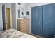 Bedroom with a closet and mirror over the dresser at 3200 Cove Cay Dr # 5F, Clearwater, FL 33760