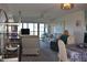 Spacious living room with plenty of natural light from sliding glass doors to balcony at 3200 Cove Cay Dr # 5F, Clearwater, FL 33760