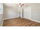 Bright bedroom features wood-look floors, offering natural light and closet space at 3509 Brookston Dr, Holiday, FL 34691