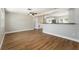 Open-concept living area showcasing updated floors, fresh paint and an inviting atmosphere at 3509 Brookston Dr, Holiday, FL 34691