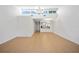 Spacious living room with high ceilings, tile floors, and plenty of natural light at 4326 Fern Glen St, Holiday, FL 34691