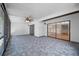 Spacious screened patio with sliding glass doors leading inside the home at 4326 Fern Glen St, Holiday, FL 34691