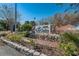 Attractive entrance sign for BayOaks community, with a stone base, manicured plants, and clear address display at 5265 E Bay Dr # 521, Clearwater, FL 33764