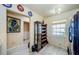 A kitchen eating nook area showing a window and a storage cabinet next to the refrigerator at 5265 E Bay Dr # 521, Clearwater, FL 33764