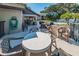 Outdoor patio area with seating, grills, and a covered space, ideal for gatherings and enjoying the community amenities at 5265 E Bay Dr # 521, Clearwater, FL 33764