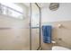 Bathroom with shower and towel rack at 7022 Kingsway Dr, Port Richey, FL 34668
