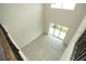 Spacious great room with soaring ceilings, tile flooring, and a large window wall offering ample natural light at 723 Steel Dr, Apollo Beach, FL 33572
