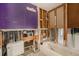 Bathroom being remodeled, showing framing, fixtures, and plumbing at 814 Florida Ave, Palm Harbor, FL 34683