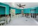 Bedroom with white trim, ceiling fan, and evidence of remodeling needed at 814 Florida Ave, Palm Harbor, FL 34683