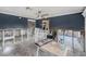 Open living room space with tile floors and unfinished walls, ready for customization and renovation at 814 Florida Ave, Palm Harbor, FL 34683