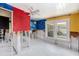 View of a room showing custom artwork, and windows with remodel needed at 814 Florida Ave, Palm Harbor, FL 34683
