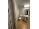 Cozy half bath at 8405 Costa Bella Way, Temple Terrace, FL 33637