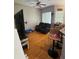 Open concept living room with hardwood floors at 8405 Costa Bella Way, Temple Terrace, FL 33637