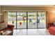 Enclosed back porch overlooking a well maintained backyard at 855 Pinewood W Ter, Palm Harbor, FL 34683