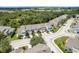 A beautiful aerial view of a residential neighborhood showcasing houses with well-kept yards at 9630 Carlsdale Dr, Riverview, FL 33578
