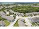 An aerial view of a community with lush greenery, manicured lawns, and well-maintained streets at 9630 Carlsdale Dr, Riverview, FL 33578