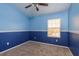 The bedroom is bright and features a two-tone paint scheme and carpeted floors at 9630 Carlsdale Dr, Riverview, FL 33578