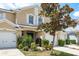 Charming townhome with an attached garage, and a welcoming front entrance at 9630 Carlsdale Dr, Riverview, FL 33578